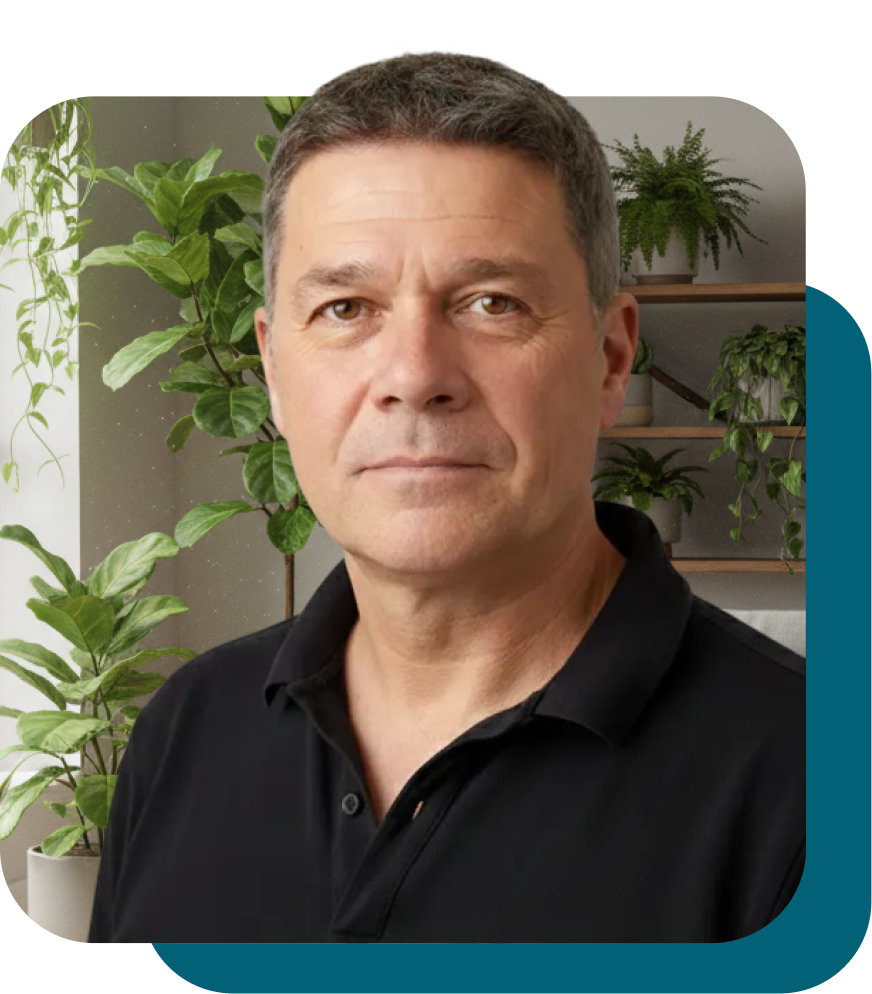 Mann vor Pflanzen in modernem Raum